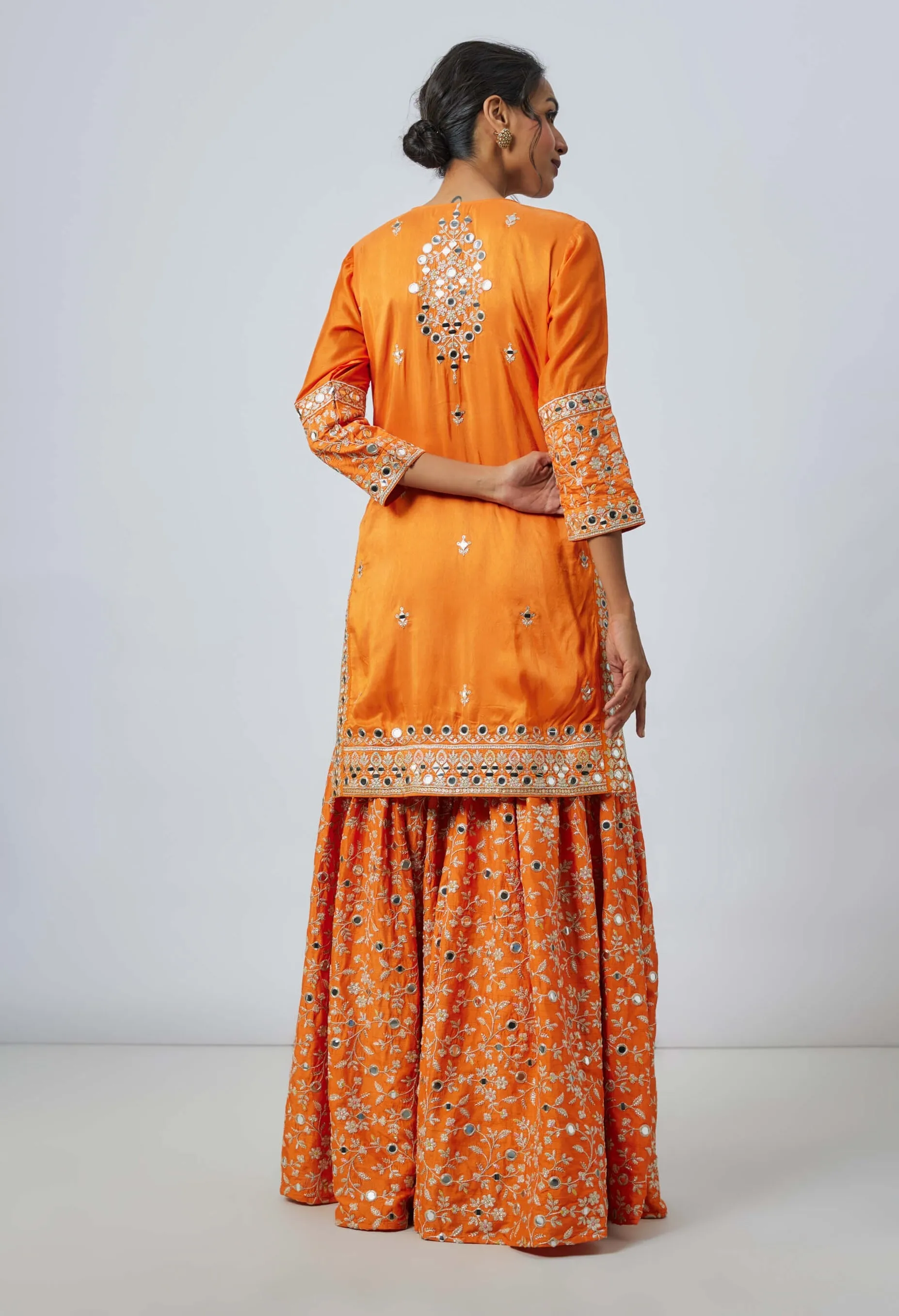 Aadhira orange sharara set
