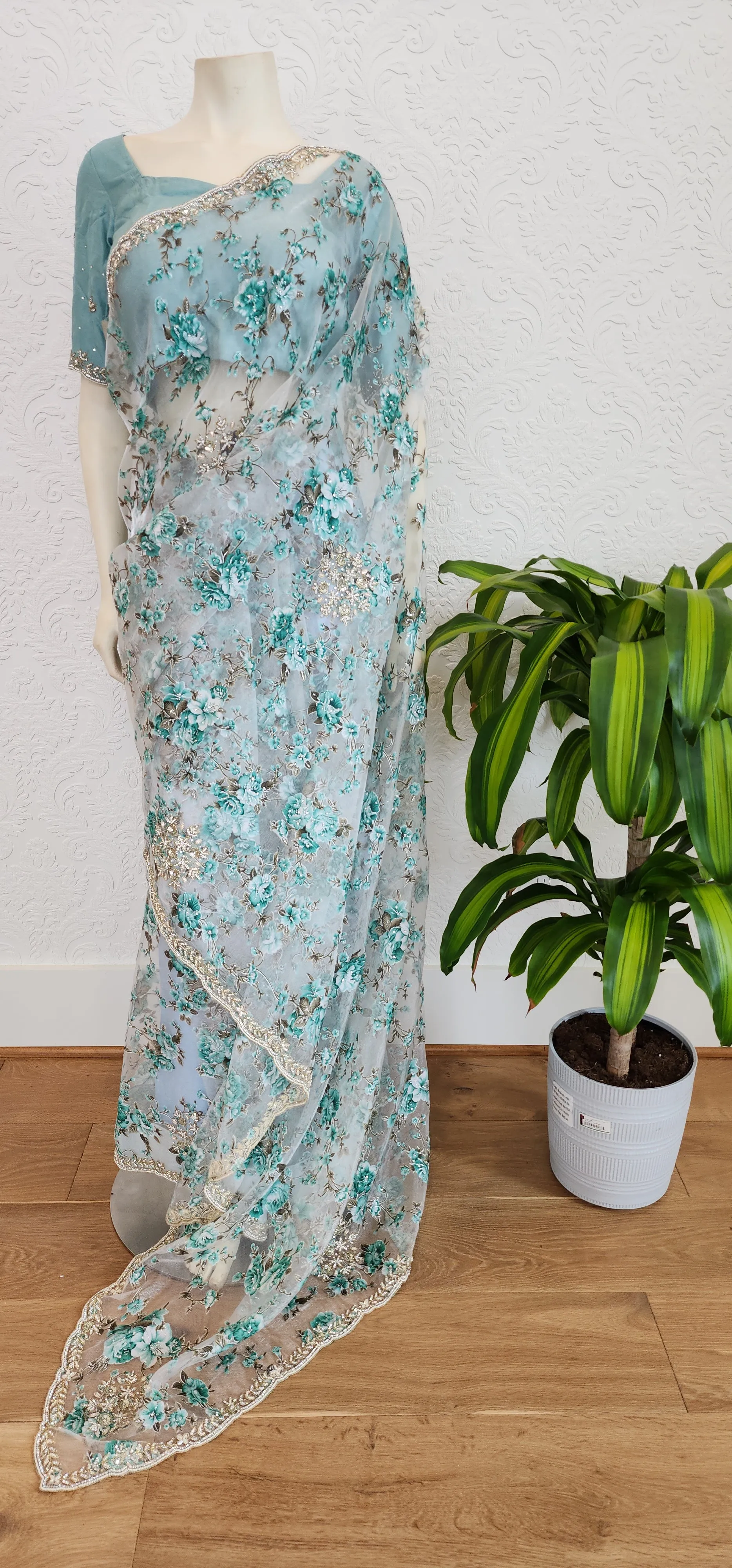 Floral Organza sarees With Pearl work Border and Blouse.