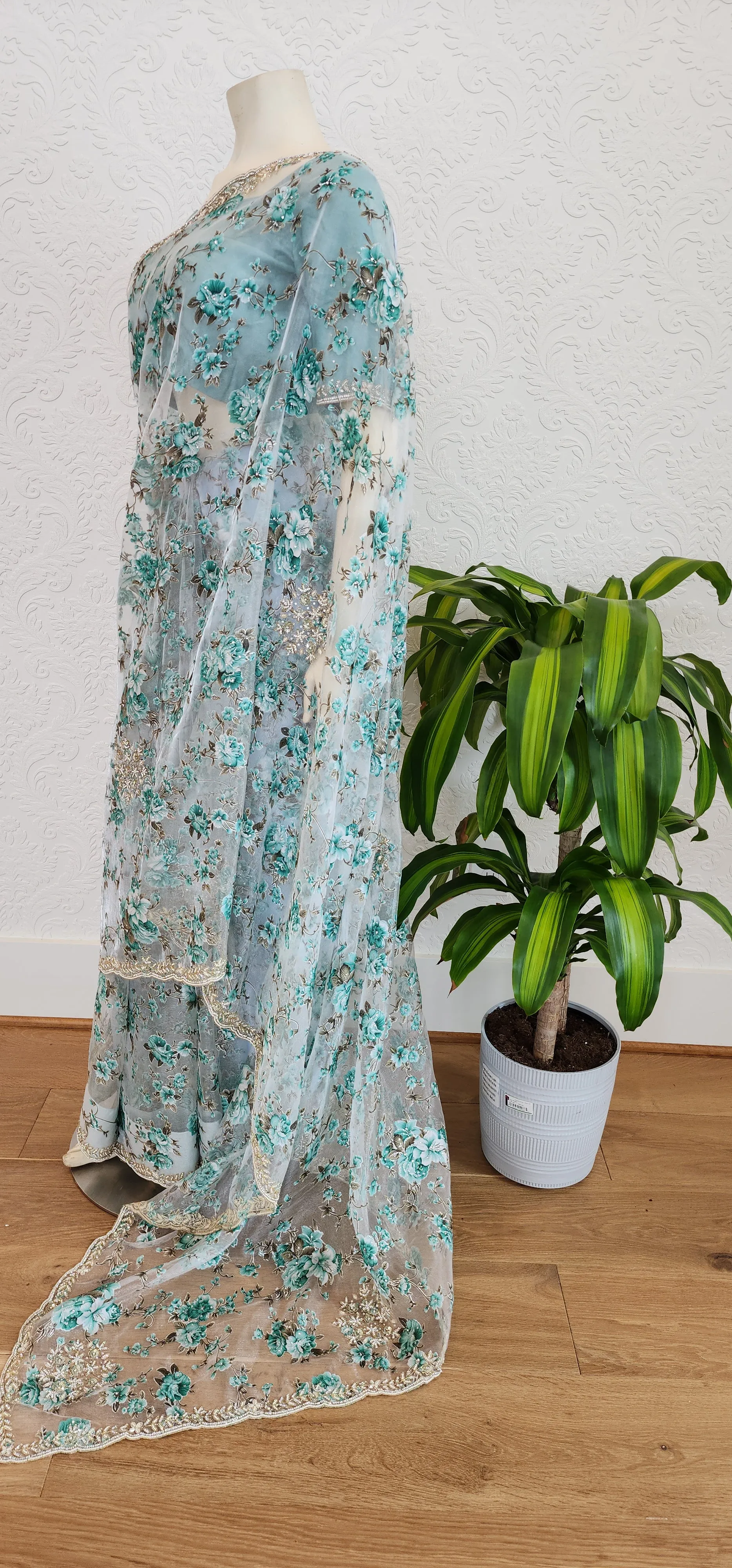 Floral Organza sarees With Pearl work Border and Blouse.