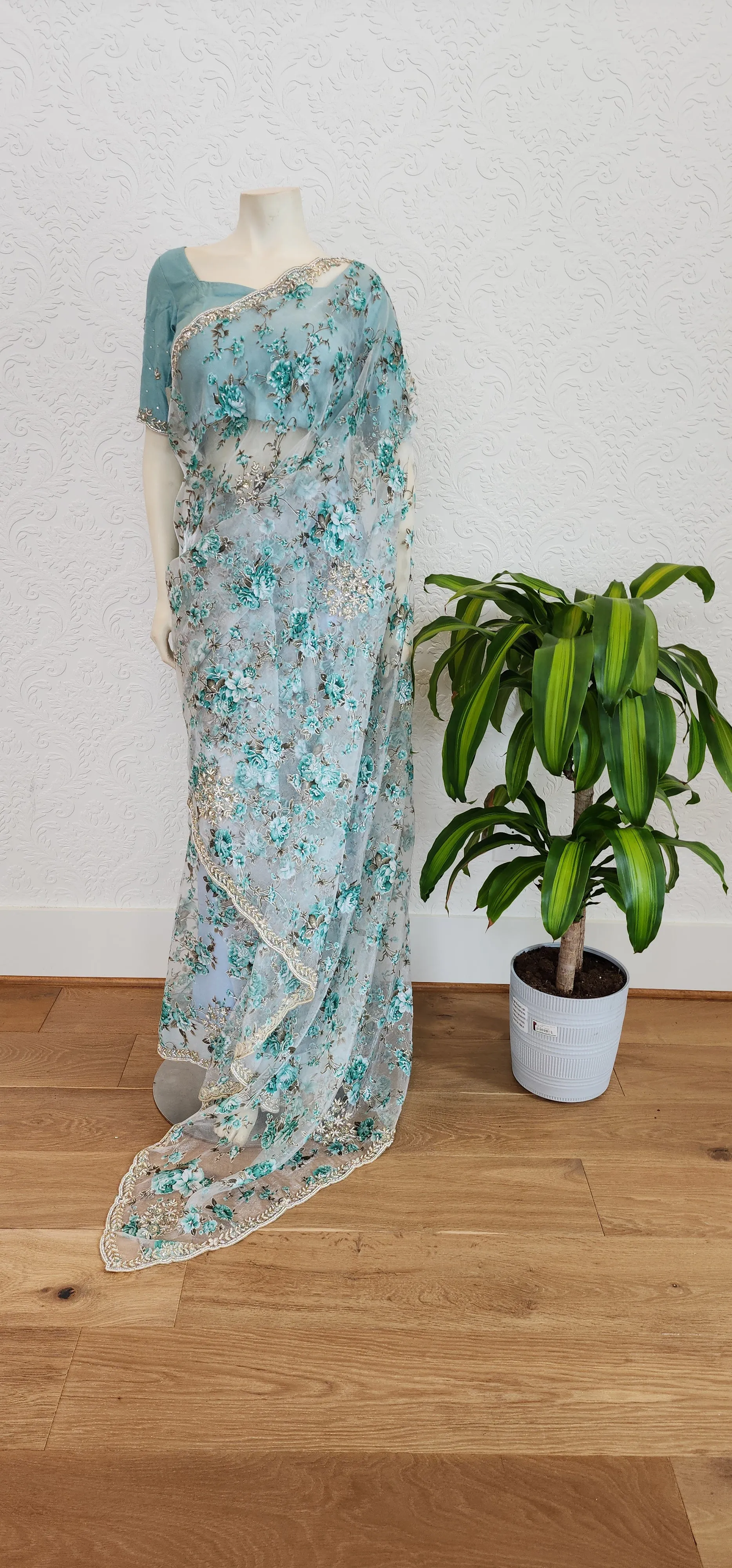 Floral Organza sarees With Pearl work Border and Blouse.