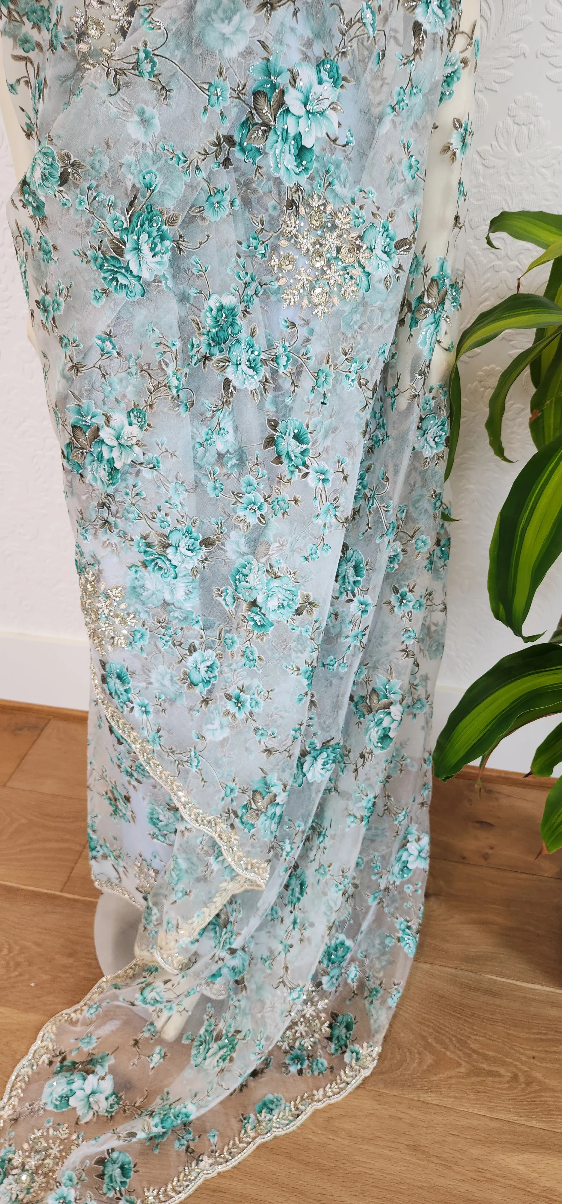 Floral Organza sarees With Pearl work Border and Blouse.