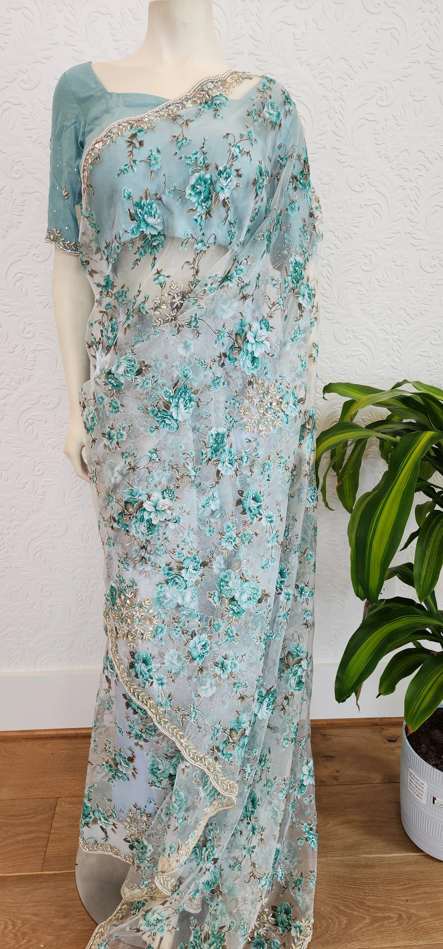 Floral Organza sarees With Pearl work Border and Blouse.
