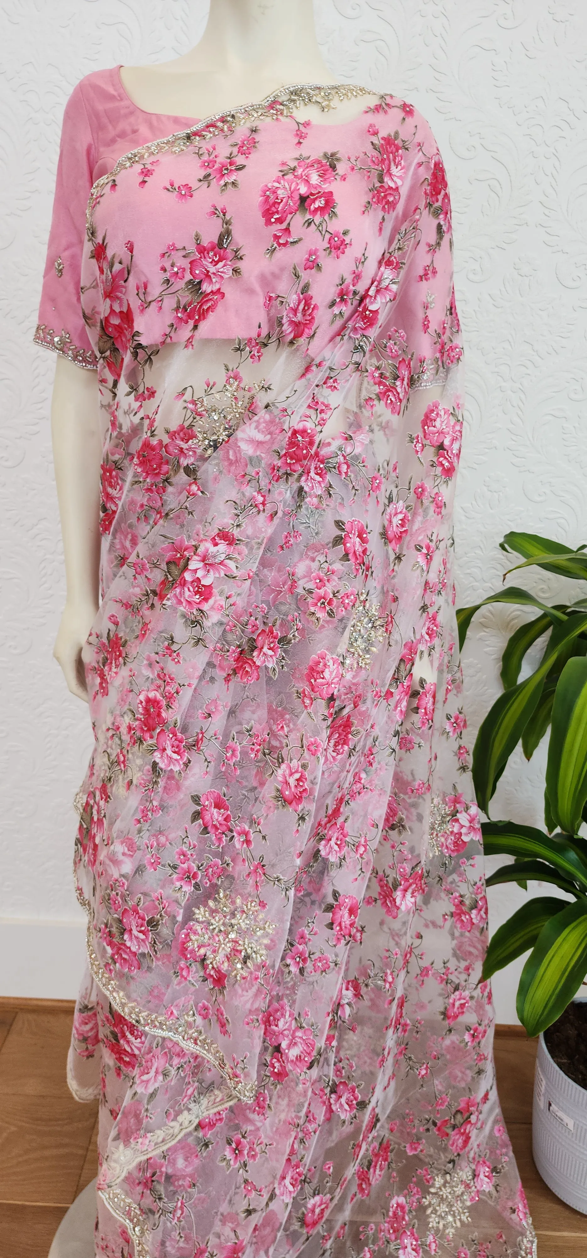 Floral Organza sarees With Pearl work Border and Blouse.